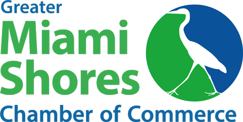 Logo for Greater Miami Shores Chamber of Commerce featuring a white heron silhouette inside a blue and green circle, highlighting the vibrant spirit of Miami Shores with the organization's name in bold text.